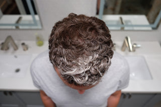 Customer Eric showing his transformed head of curly hair after applying Tortoise and Hair fibers